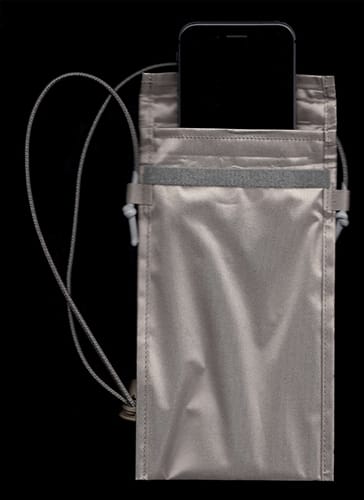 Scan of an open faraday bag with a phone coming out of it